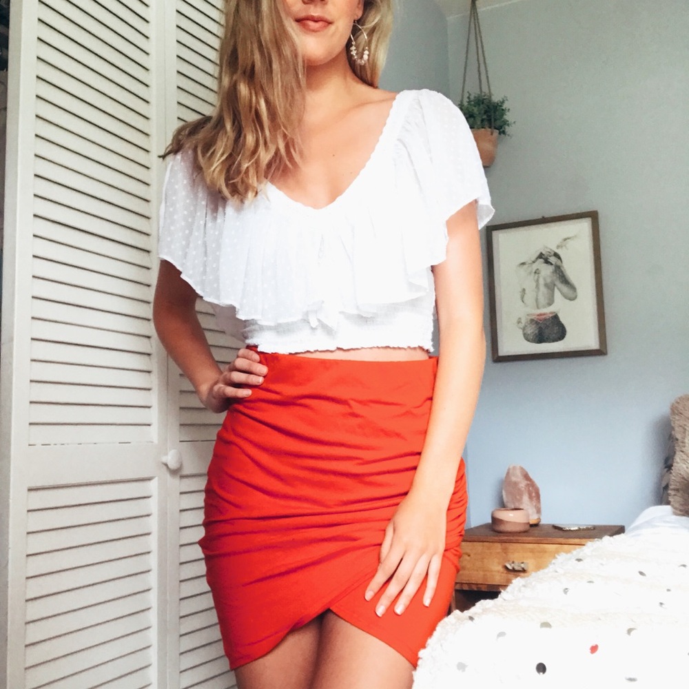High waisted fitted skirt with cross front red